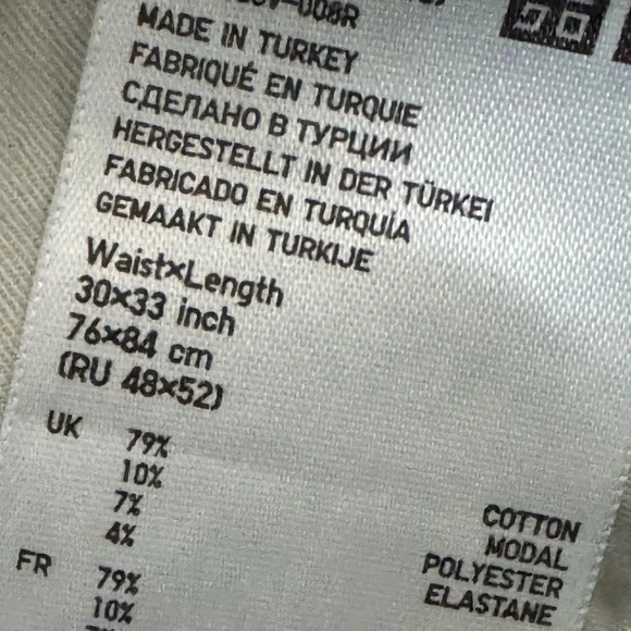 Uniqlo Men’s Mid Rise Stretch Skinny Jeans Size 30X34 - Picture 2 of 4